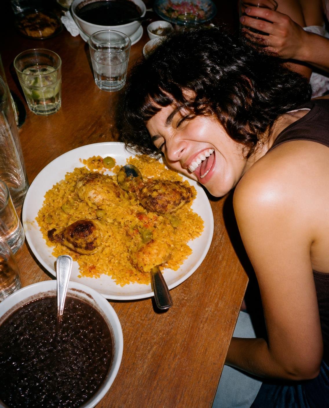 Guest laughing at the table